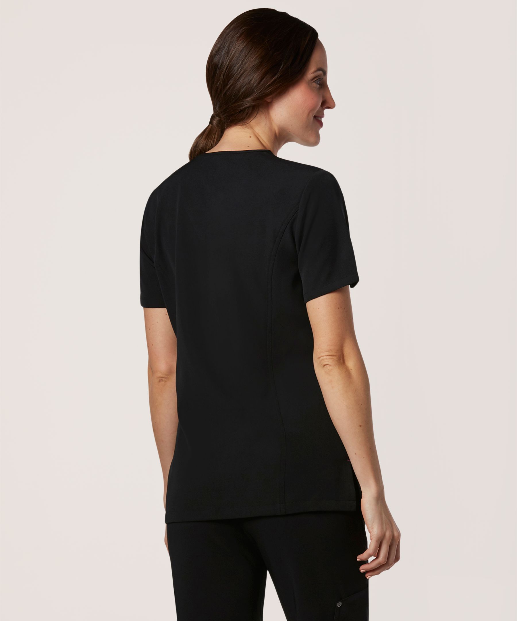 Haut d'uniforme médical performant HEALTH PRO en tissu FLEXTECH extensible dans 4&nbsp;sens avec encolure en V, pour femmes Back_Angled_Right