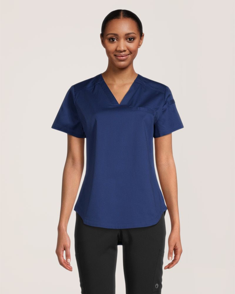 Haut d'uniforme médical avec encolure en V et 3&nbsp;poches à porter dans le pantalon pour femmes