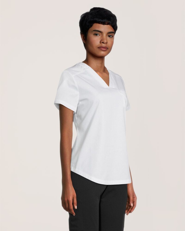 Haut d'uniforme médical avec encolure en V et poche à porter dans le pantalon pour femmes